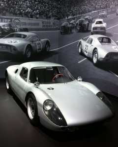 Porsche had a small hall to itself with artful displays including this 904 with photo backdrop. A revamped Cayman was shown too. 