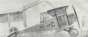The Microplano, posed in front of Building No. 8 of TNCA. 